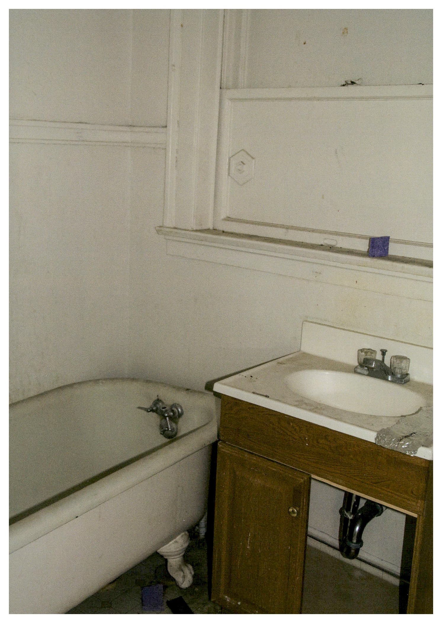 Before: same view of non-historic bathroom and solid-glazed light well window.